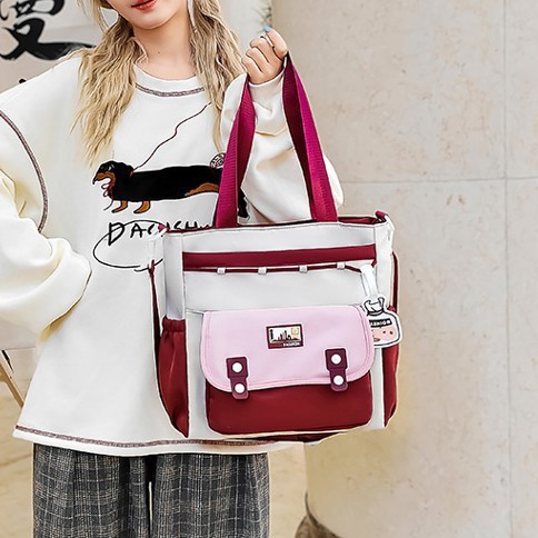 The 2025 new style of fresh, cute and color-blocking hand-held crossbody bag is simple and of high appearance level, a tote bag for primary and secondary school students' classes full figure