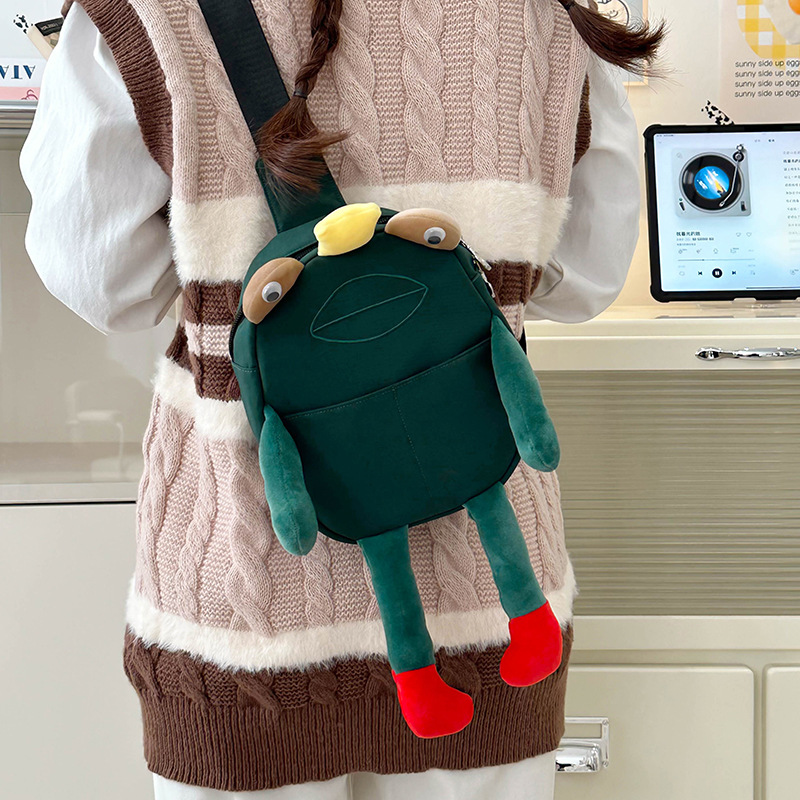 A cute and quirky Japanese cartoon crossbody bag for spring 2025, an ugly and adorable frog chest bag, and a unique mobile phone case details Picture