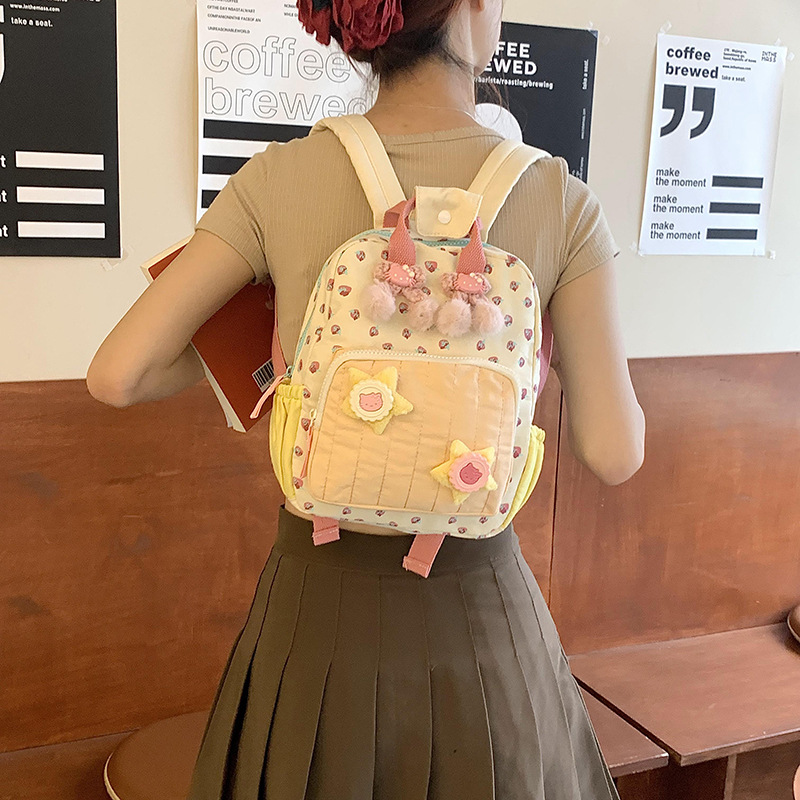 2024 New canvas strawberry-printed girls' schoolbag, dopamine color-blocking backpack, cute mini commuter bag details Picture