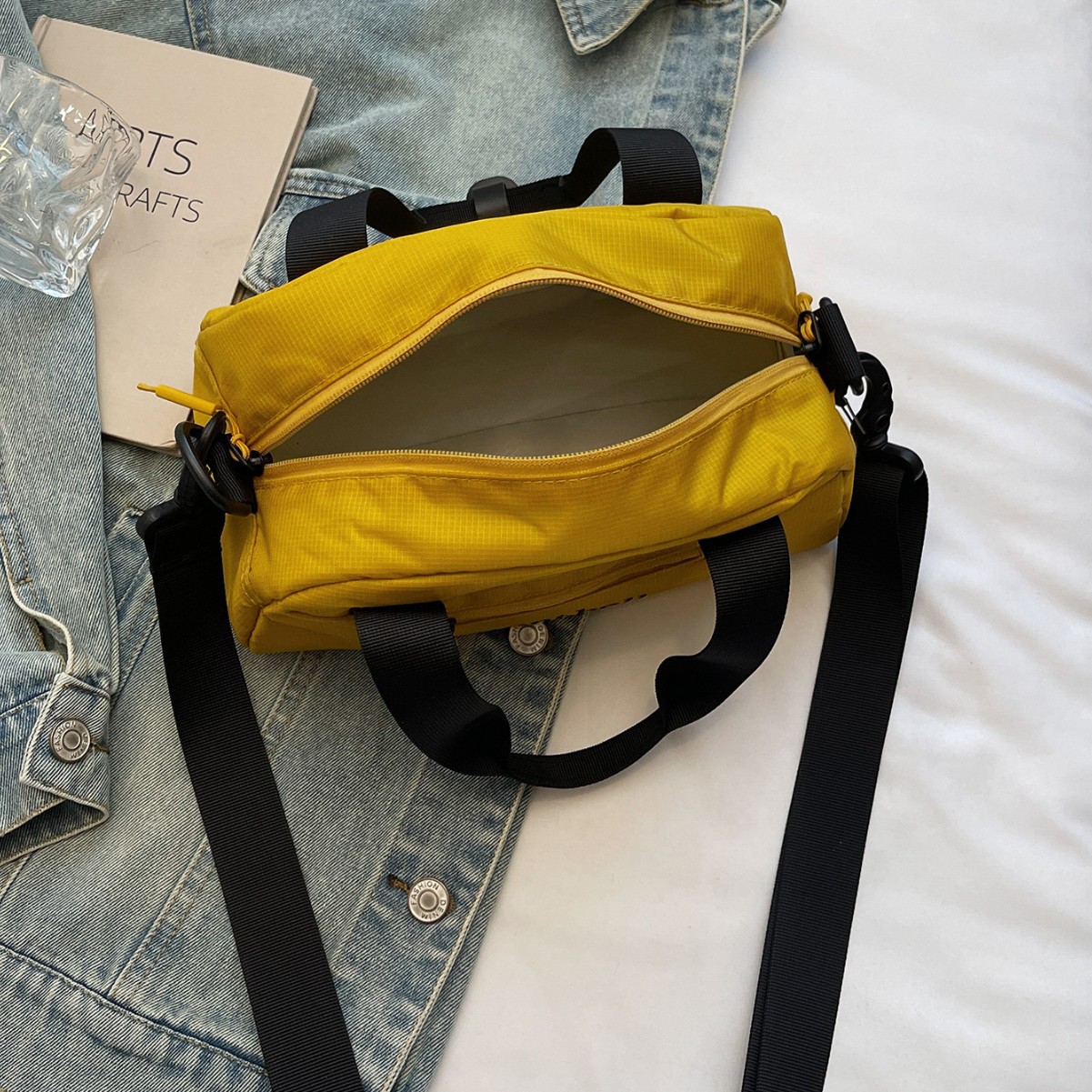 A new Japanese Instagram sporty crossbody bag with a high level of appearance and cool letters. It is a casual, simple and lightweight crossbody bag for travel Application Scenario