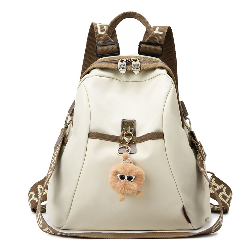 This is a new 2024 fashionable and lightweight travel bag for women, made of Oxford fabric. It's a versatile travel backpack for moms and kids Item Picture