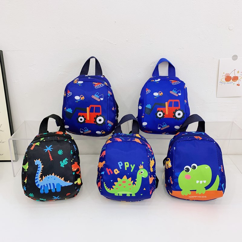 The new cartoon dinosaur double-shoulder backpack for boys and girls with anime prints is a fashionable and trendy backpack for kindergartens full figure
