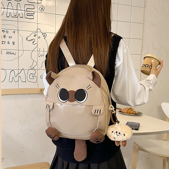 The new schoolbag is a cute and cute cartoon cat for girls, a children's spring outing backpack with a unique and funny style, and a lightweight travel backpack full figure