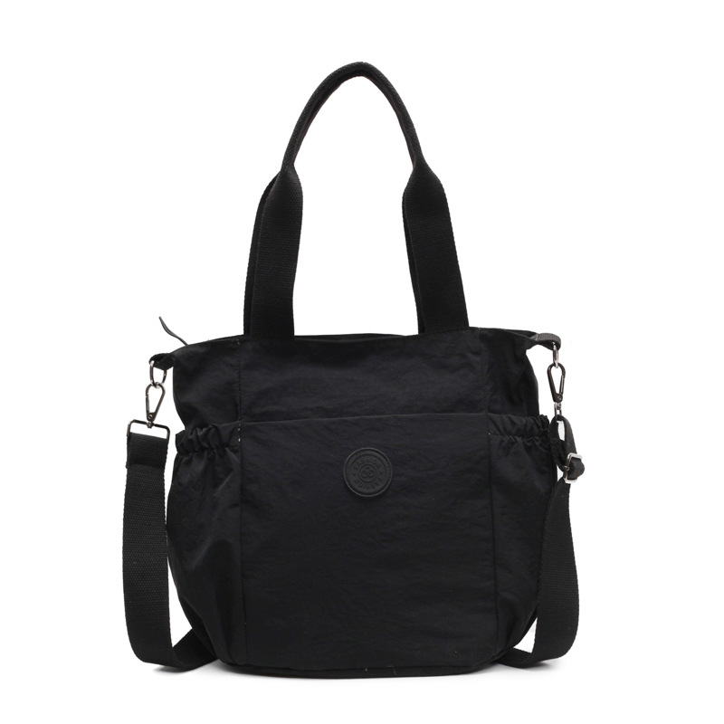 Korean large-capacity solid-color women's bag, spring outdoor commuting casual and convenient bag, simple women's hand-held crossbody single-shoulder bag Item Picture
