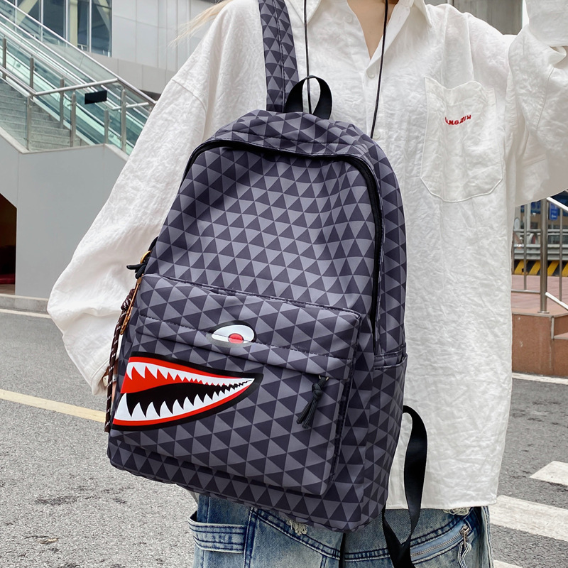 New Korean-style checkered backpack, casual and trendy large-capacity computer bag, and schoolbag for primary and secondary school students, junior high school and senior high school details Picture