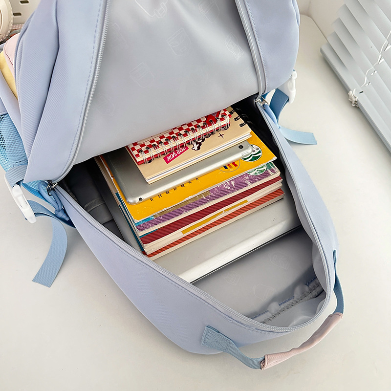 A new Japanese-style ins high-appearance-level, fresh and sweet, transparent, pain-hugging bag for women with color-blocking and large-capacity backpacks Application Scenario
