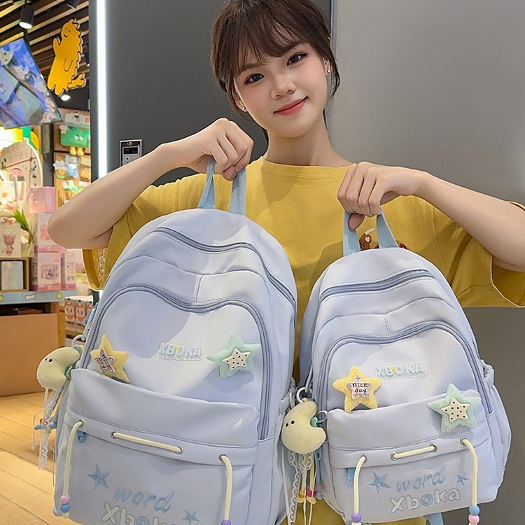 A new high-appeal, fresh and sweet schoolbag with a college style, a casual, simple, lightweight and versatile backpack for junior and senior high school students full figure