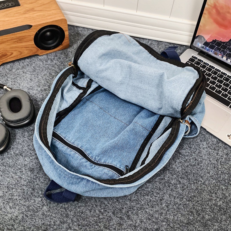 A large-capacity, simple and casual student backpack with a laid-back style, forest-themed vintage feel on Korean Instagram Application Scenario