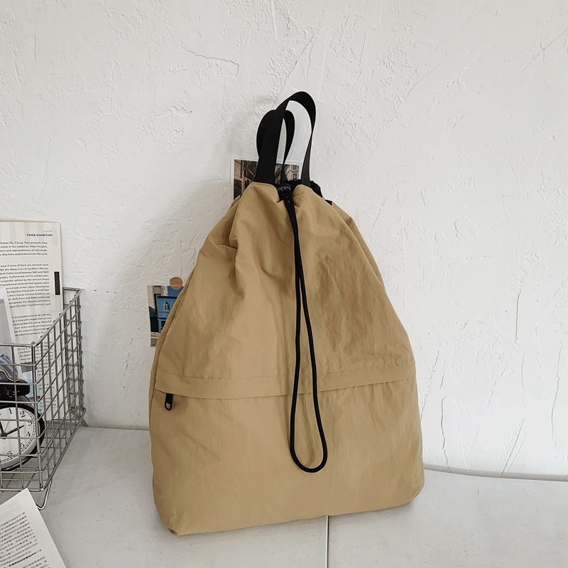 Niche drawstring backpacks for men, casual schoolbags for women, lightweight outdoor cycling backpacks, drawstring bags, hiking travel bags for men Specification drawing