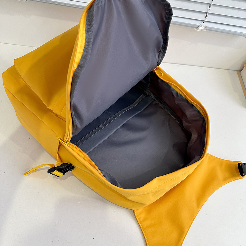 Japanese-style simple and versatile backpack, Korean-style solid color student schoolbag, lightweight, trendy, casual and fashionable backpack Application Scenario