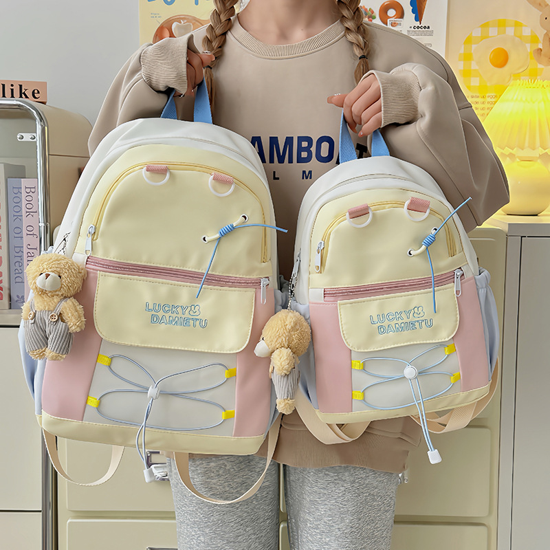 High appearance level schoolbag for girls, Korean version of Instagram, large-capacity backpack for middle and high school students, dopamine soft girl spring outing backpack full figure