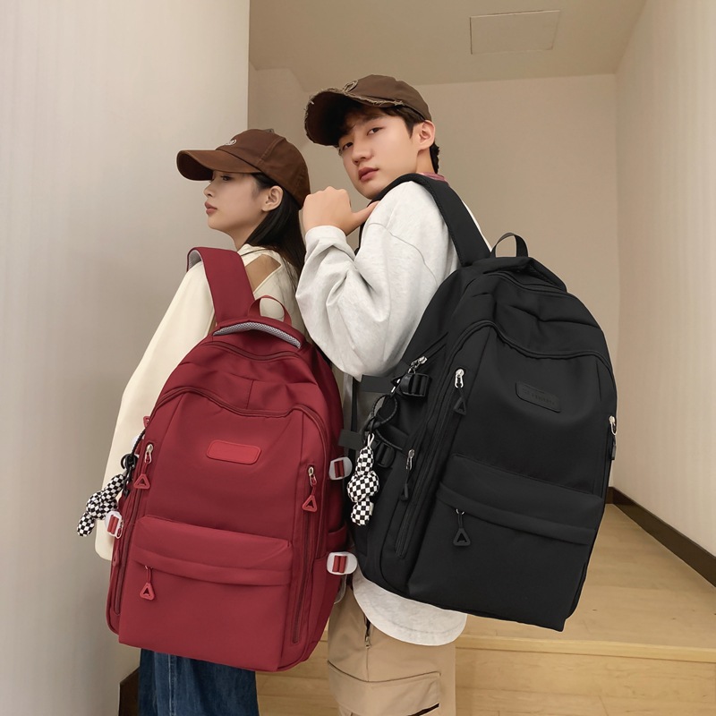 The 2023 new Korean-style ins college student couple backpack is lightweight and simple, a backpack for junior and senior high school students full figure