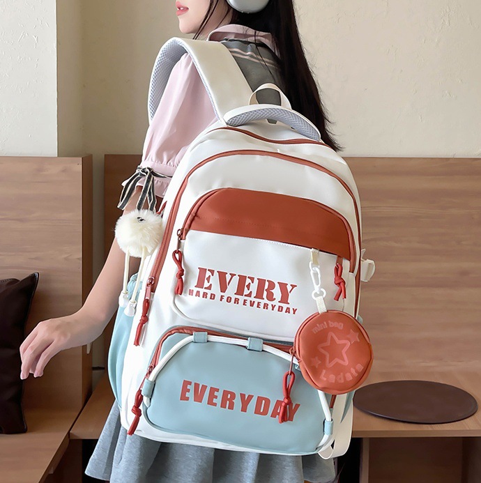 2024 New high-quality, lightweight and lightweight schoolbag for female students, casual travel, color-matched backpacks for junior and senior high school boys full figure