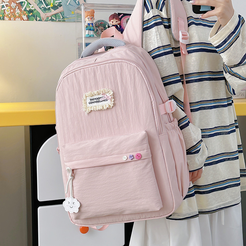 A new Harajuk-style Korean Instagram backpack with a high level of appearance, fresh and sweet. It is a lightweight and large-capacity backpack for junior and senior high school students details Picture