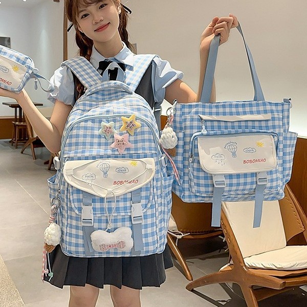 A new high-appeal, fresh and sweet checkered tutorial bag for junior and senior high school students, a simple, lightweight and large-capacity three-piece backpack details Picture