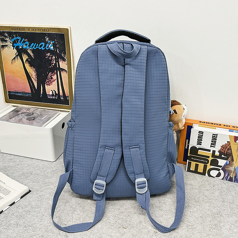 A new Korean-style ins solid-color backpack for couples, featuring a casual, simple, lightweight and versatile large-capacity backpack Specification drawing