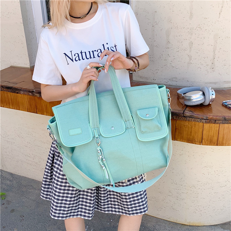 Large-capacity commuter tote bag for women 2025 new style casual and versatile handbag, canvas travel single-shoulder crossbody bag full figure
