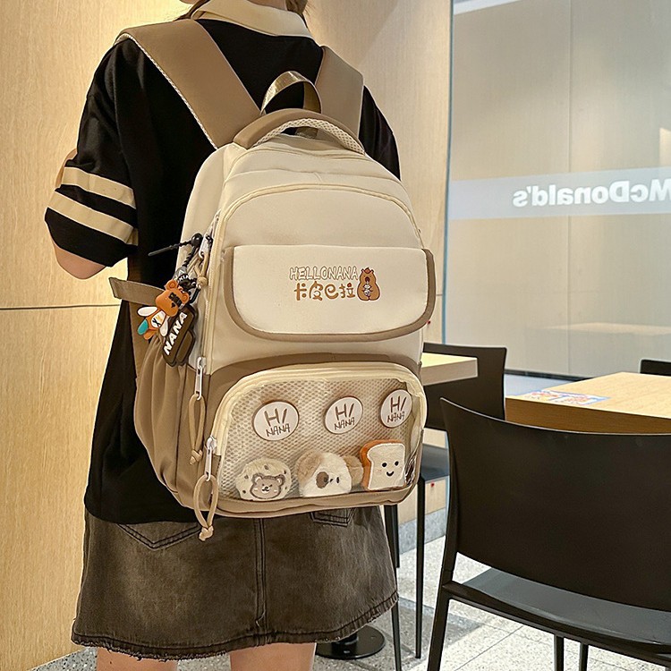 A new high-appeal, fresh and cute Capibara pattern backpack for junior and senior high school girls, a lightweight and large-capacity backpack details Picture