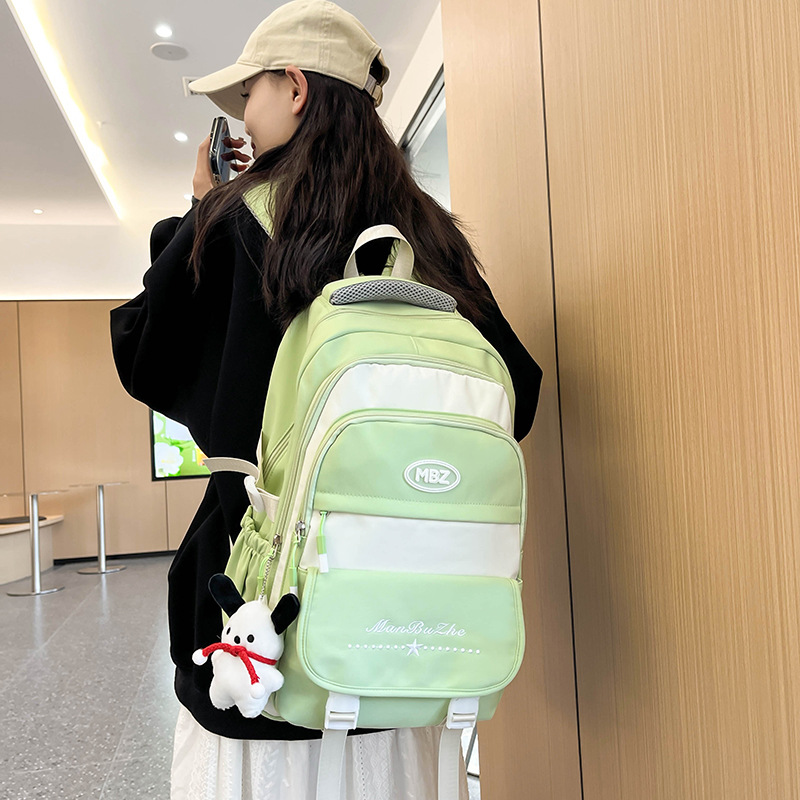New ins large-capacity backpacks for junior and senior high school students, Korean version color-blocking backpacks for students in grades three to six full figure