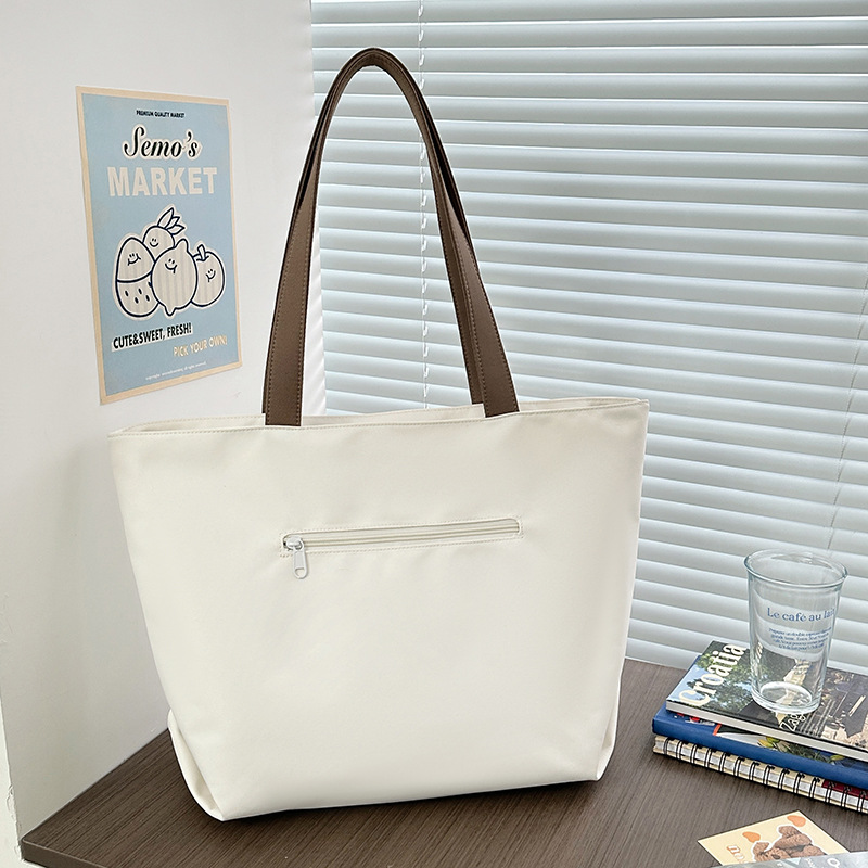 Creative and personalized single-shoulder bag, large-capacity hand-held shopping bag, new summer simple college student tote bag for class Specification drawing