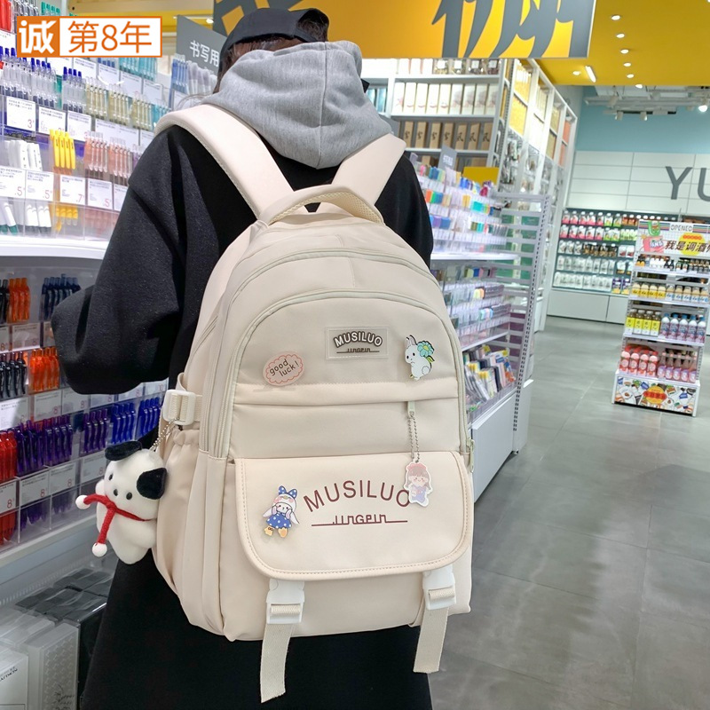 This is a large-capacity backpack for middle school students in grades three to six with an ins style Korean schoolbag full figure