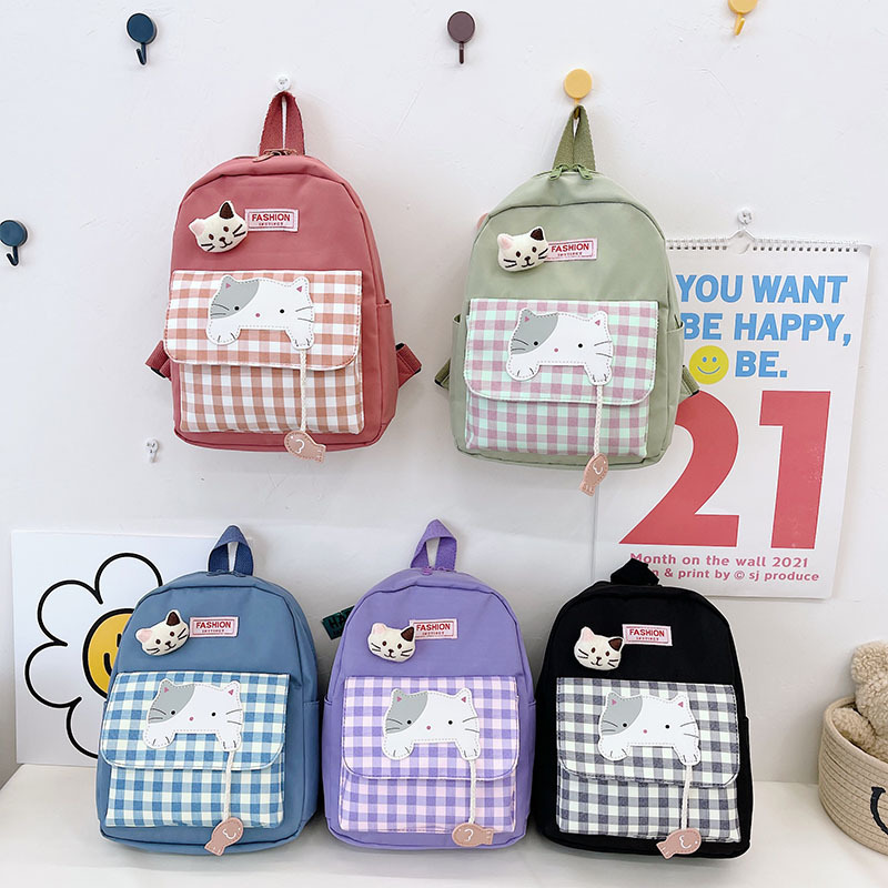 Large-capacity backpack for girls in solid color, schoolbag for primary and middle school students, Korean-style campus backpack, cute cat and fashionable schoolbag full figure