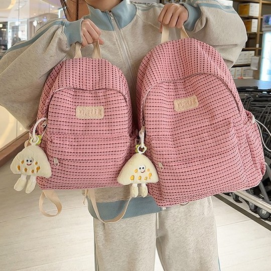 The new Korean version of the forest-themed ins high-appearance-level fresh and sweet striped backpack is a versatile large-capacity backpack for high school students full figure