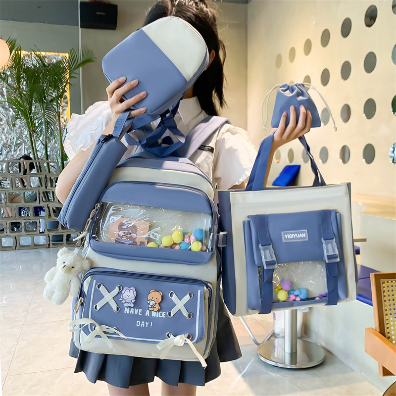 Wholesale of new large-capacity girls' schoolbags in Korean style, cute and versatile, color-blocked backpacks, and trendy color-blocking primary school backpacks full figure