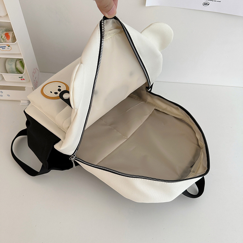 The new cartoon schoolbag is cute and adorable. It's a small backpack for children's travel, with a unique and creative design. It's a soft and cute backpack for girls' travel Application Scenario