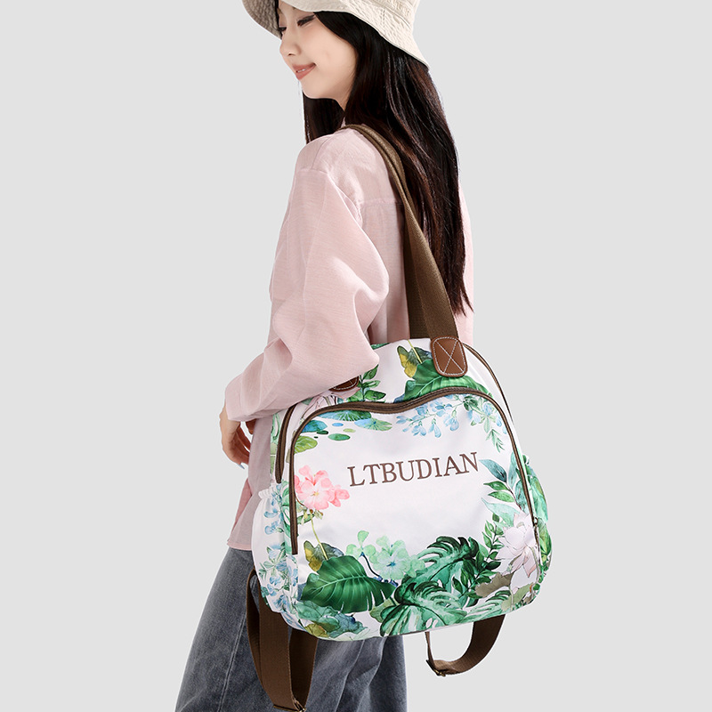A new high-appeal, fresh and sweet floral print mini backpack for women, a multi-purpose, lightweight backpack for shopping and traveling full figure