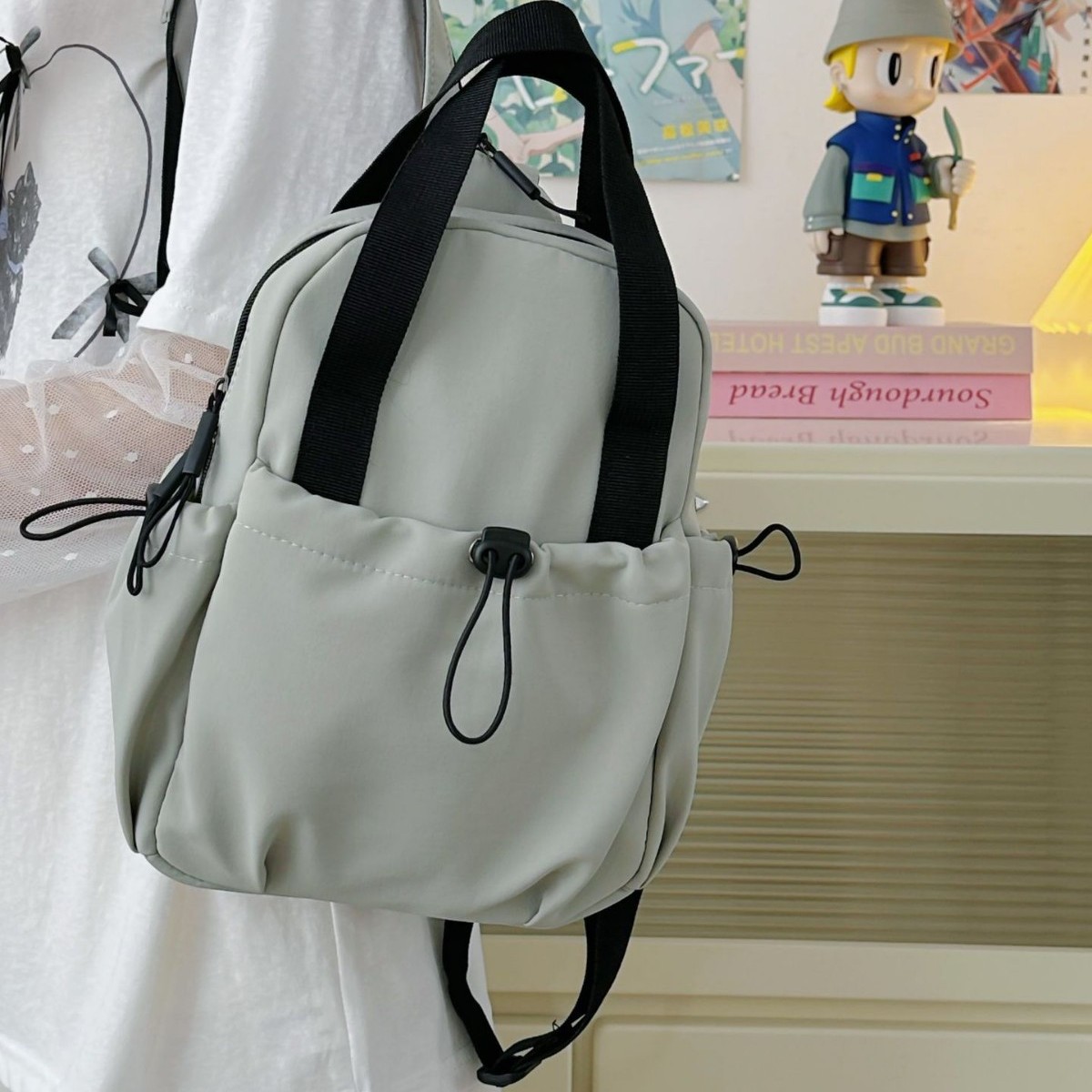 Summer new simple solid color mountain-style functional small shoulder bag, versatile for outdoor travel and sports, lightweight small backpack for men details Picture