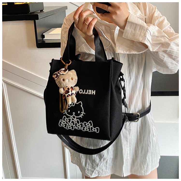 Early spring new Japanese-style commuting simple printed Tote canvas high school student large-capacity cute single-shoulder crossbody bag details Picture