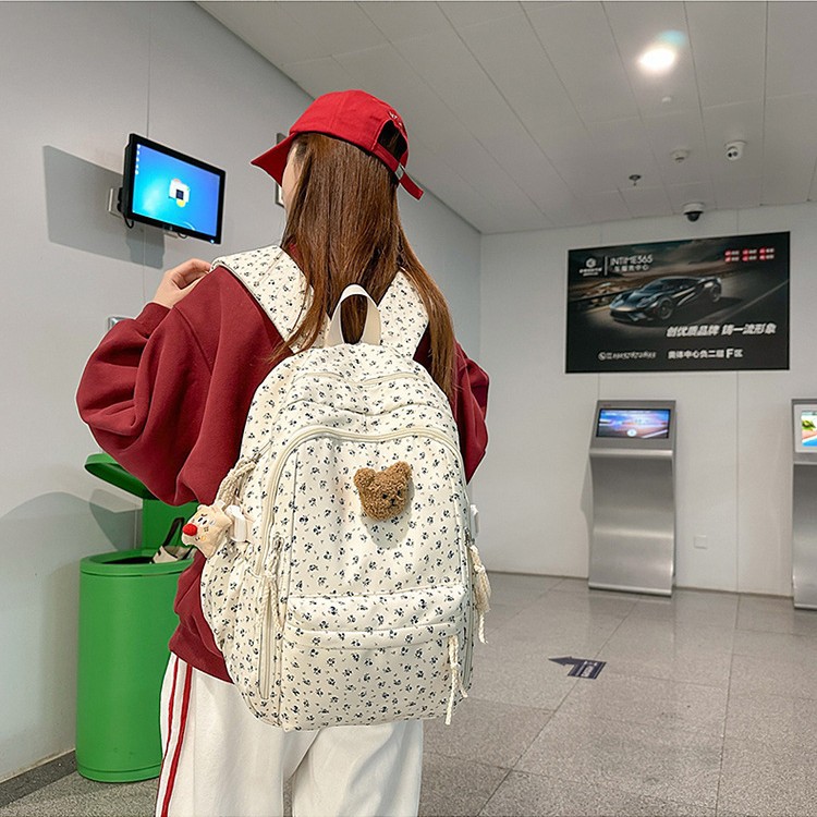 New backpack with fresh floral prints, Japanese-style high school and junior high school students, large-capacity schoolbag, casual and versatile backpack details Picture