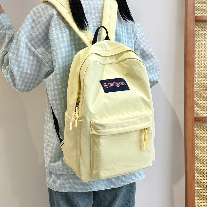New schoolbag for girls, ins campus, simple and lightweight backpack, Korean style, versatile, forest-themed backpack for junior and senior high school students full figure