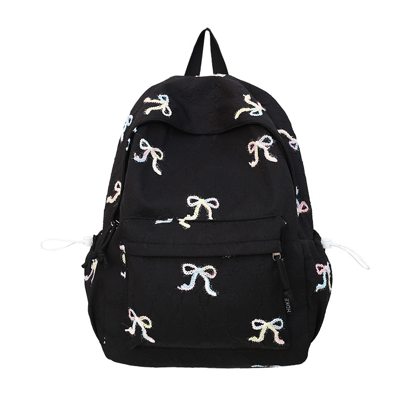 A new high-appearance-level Japanese ins fresh and sweet bow backpack, a lightweight and large-capacity backpack for junior and senior high school students Item Picture