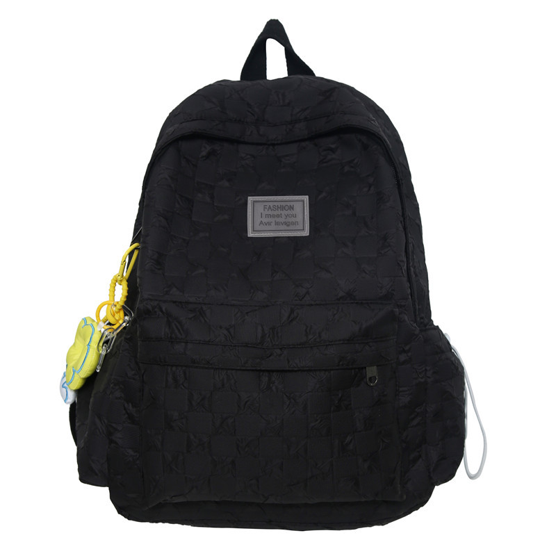 The 2025 new trendy schoolbag for girls in grades 1-6 features a large-capacity checkerboard pattern backpack and a fashionable color-blocking couple backpack Item Picture