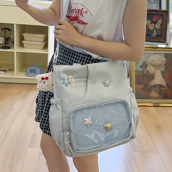 Summer new single-shoulder bag for female primary school students, solid color macaron school bag, high appearance level, sweet girl, cute, smacking pain bag details Picture