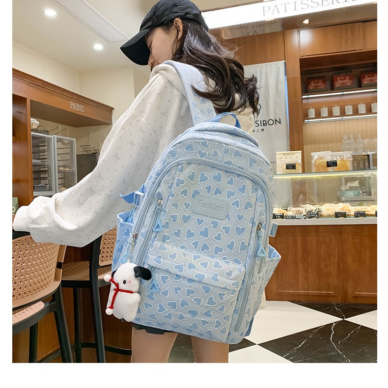 Fashionable and simple macaron-colored heart-shaped backpack, large-capacity cute girls' schoolbag, multi-functional student backpack full figure