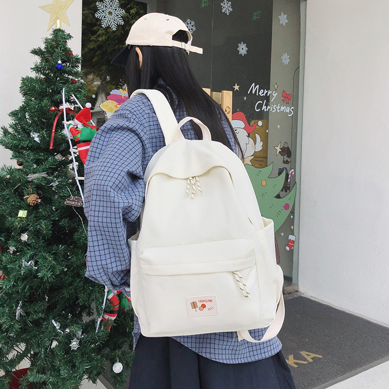 Simple and versatile casual small schoolbag, a backpack for girls in high school, college and junior high school, a lightweight backpack for commuting and traveling details Picture