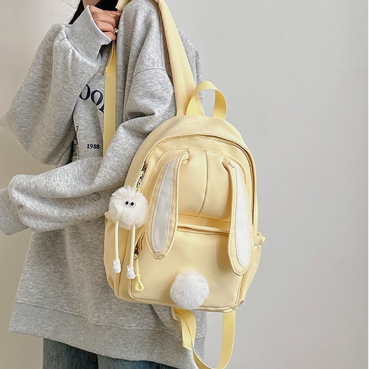 A Japanese girl with a high level of appearance, a mini backpack for traveling and shopping on Instagram, and a cute little backpack for children's spring outings and study Tours details Picture