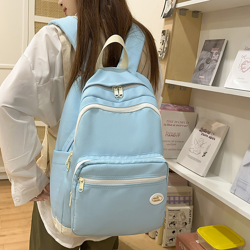 In the spring of 2025, this is a lightweight backpack for junior and senior high school students with a high appearance level, solid color and simple Korean style, and an ins college style full figure