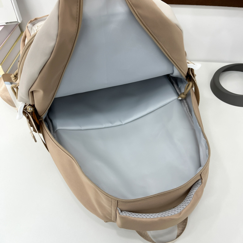Korean school style versatile and fashionable schoolbag, high appearance level, large-capacity casual color-blocking backpack, lightweight and transparent backpack Application Scenario