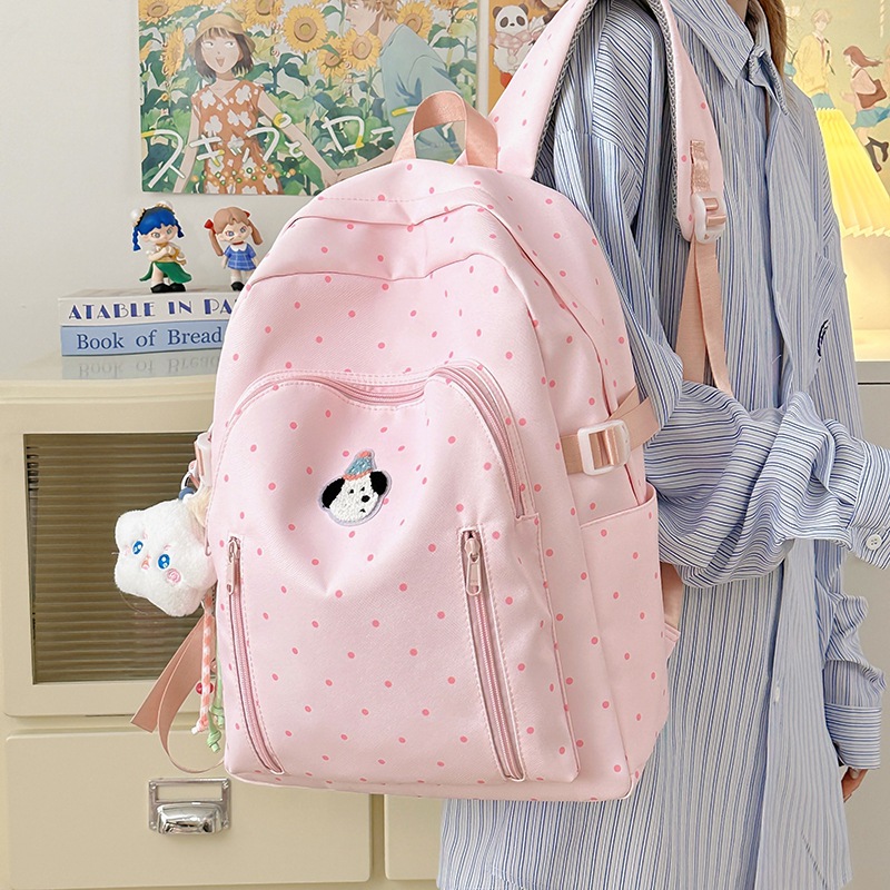 This is an ins style backpack that is versatile and has a high level of appearance. It is a polka dot Korean-style girl's backpack that is lightweight and suitable for junior high school and college students' travel details Picture