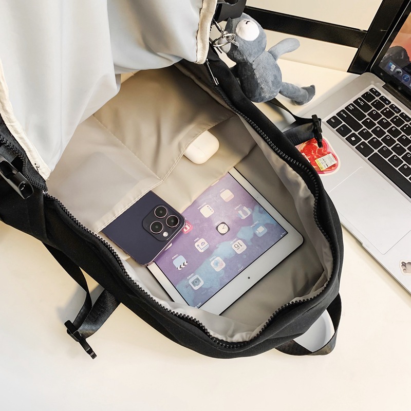 A simple and large-capacity backpack for men, a trendy and cool Hong Kong-style couple's casual travel backpack Application Scenario