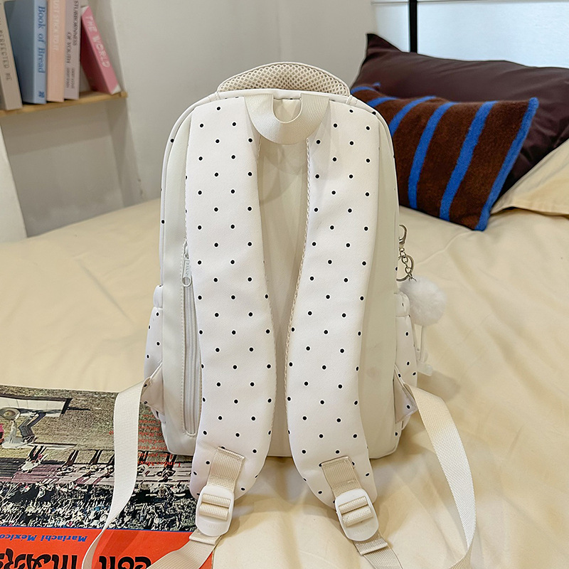 A new Japanese-style ins high-appearance-level fresh and sweet small floral backpack, a lightweight and large-capacity backpack for junior and senior high school students Specification drawing