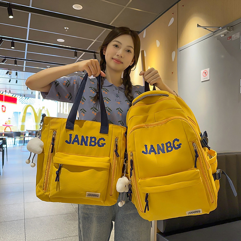 A new high-appeal Korean-style ins letter backpack for couples, featuring a casual, simple and lightweight design with a large capacity for going out details Picture
