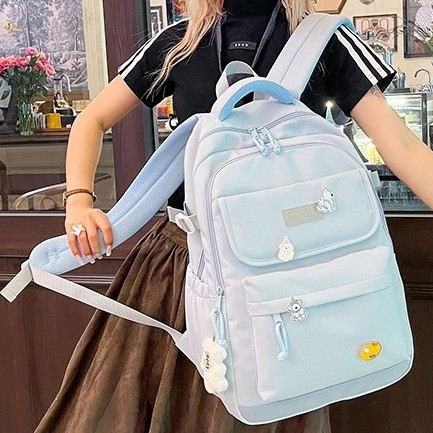 A new 2025 Korean-style ins high-appearance-level, fresh and sweet candy-colored backpack with large capacity for junior and senior high school students details Picture