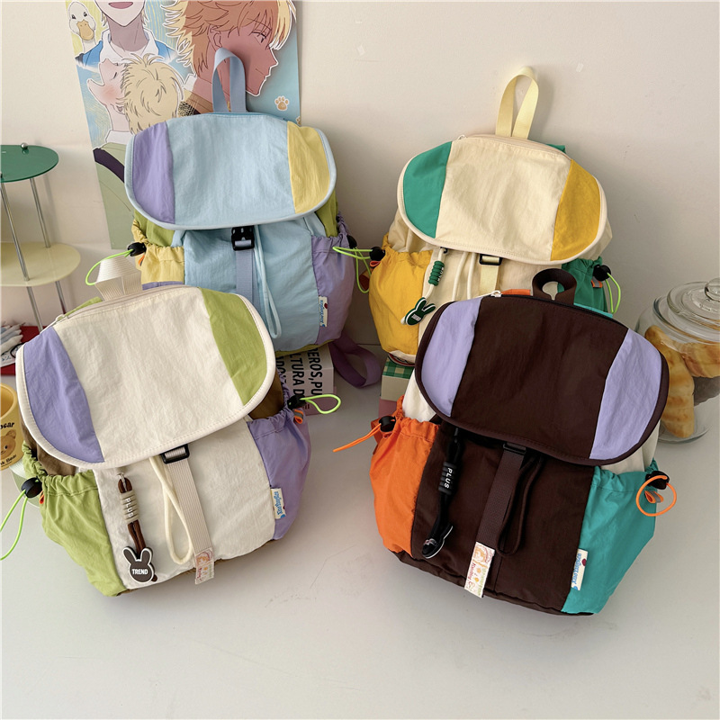 New fashionable color-blocking canvas bag for college students in class, new large-capacity schoolbag and backpack for women in 2025 details Picture