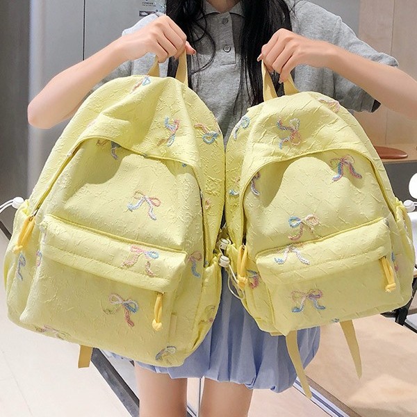 A new high-appearance-level Japanese ins fresh and sweet bow backpack, a lightweight and large-capacity backpack for junior and senior high school students details Picture