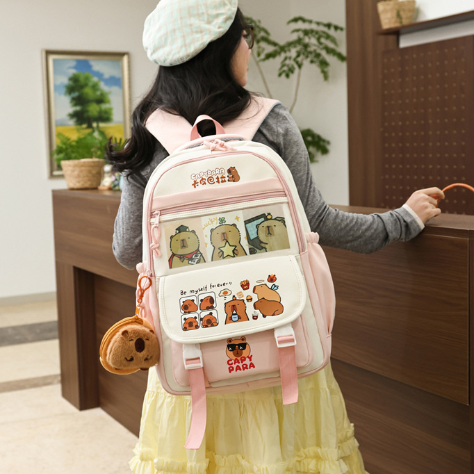 A new cartoon and cute large-capacity backpack for junior and senior high school students, a versatile Japanese backpack with multiple compartments full figure